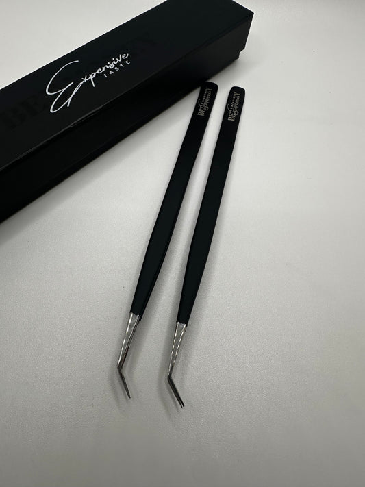 Curved isolation tweezers